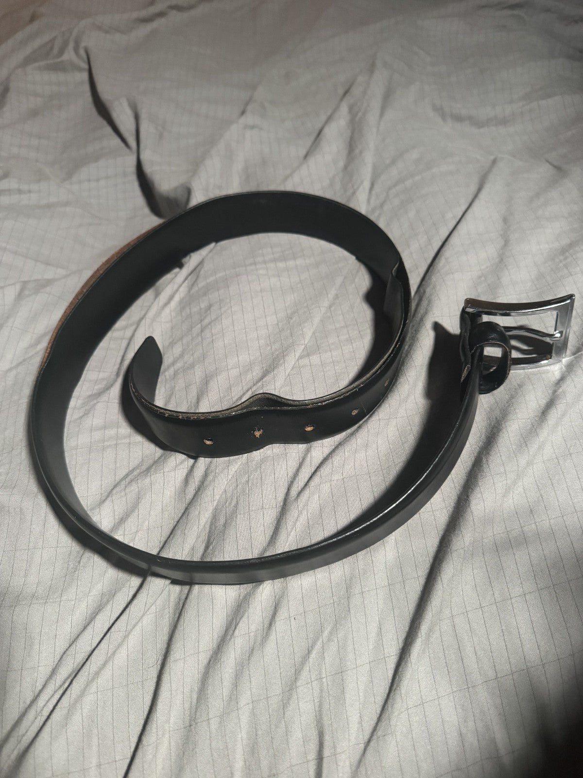 Vintage black belt with silver metal buckle