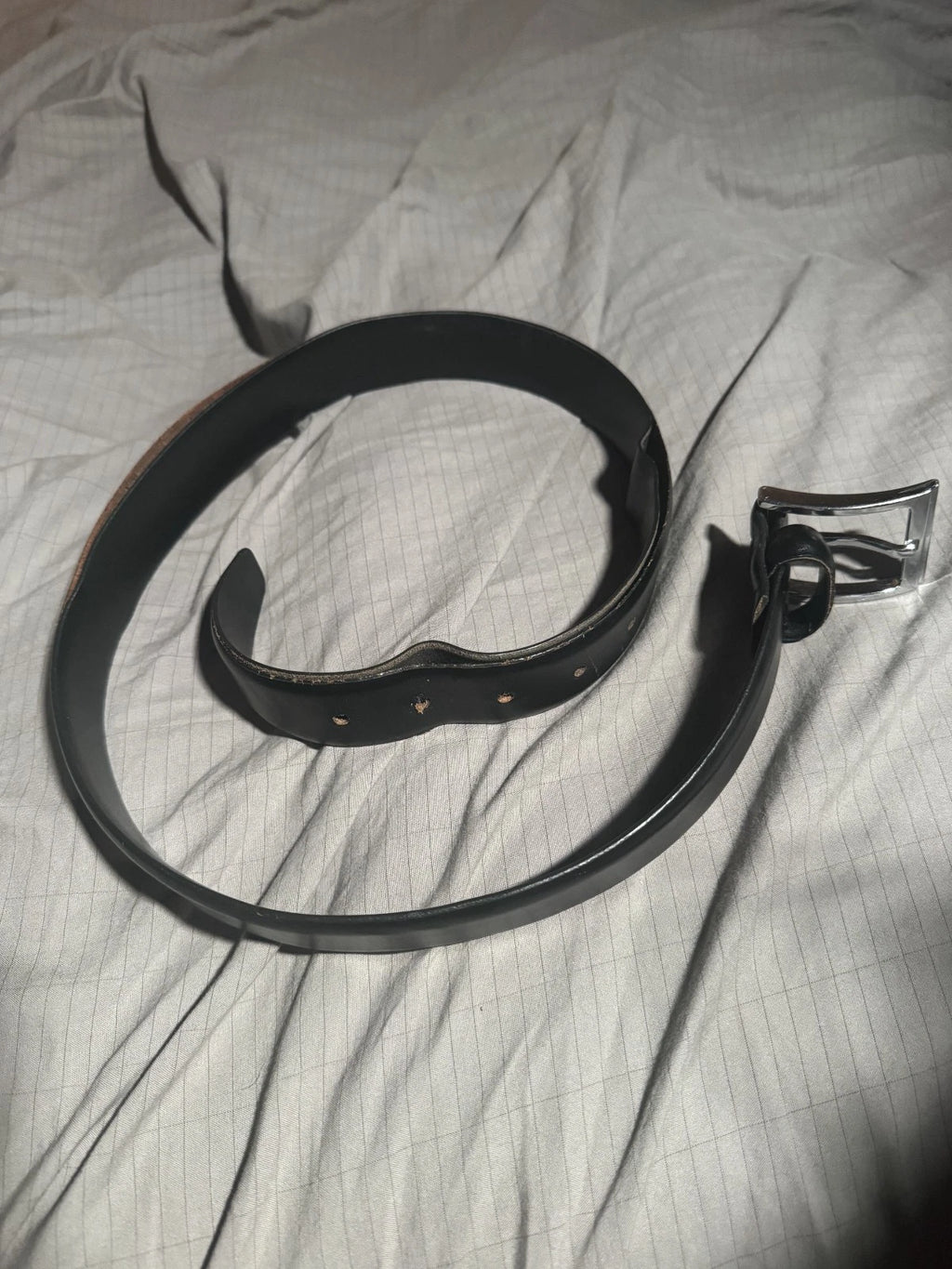 Vintage black belt with silver metal buckle